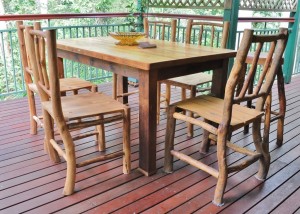 Recycled hoop pine table and stick dining chairs